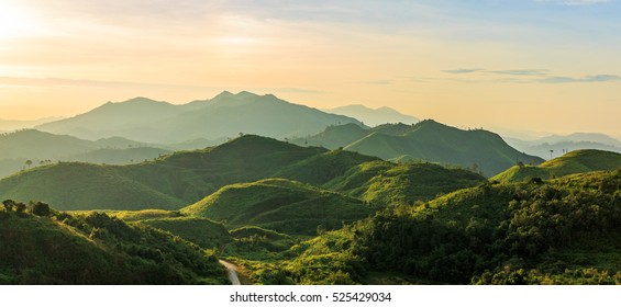 Beautiful sunrise over the mountain range at the west of thailand - Shutterstock ID 525429034