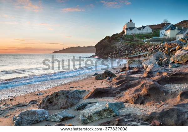 Beautiful Sunrise Over Seaside Cottages Hallsands Stock Photo