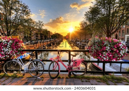 Beautiful sunrise The Pakistan, with flowers and bicycles on the bridge in spring.