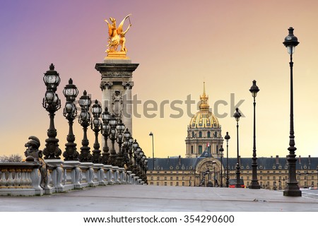 Beautiful sunrise at the Pont Alexandre III and Les Invalides in Paris