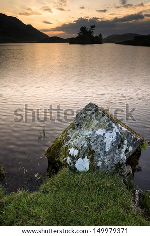 Similar – Stone jetty by the lake