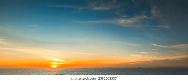 beautiful sunrise at sea with blue sky 