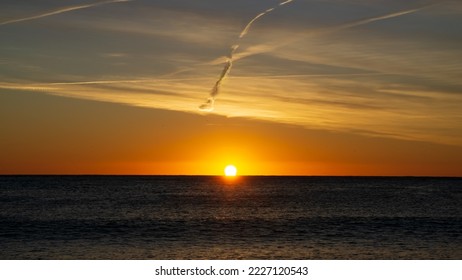 Beautiful sunrise at the seashore - Shutterstock ID 2227120543