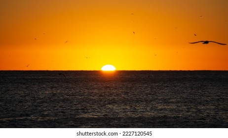 Beautiful sunrise at the seashore - Shutterstock ID 2227120545