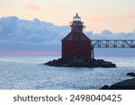 A beautiful Sunrise at Sturgeon Bay Ship Canal pierhead lighthouse located at the US coast Guard station on Lake Michigan in Door county Wisconsin. 