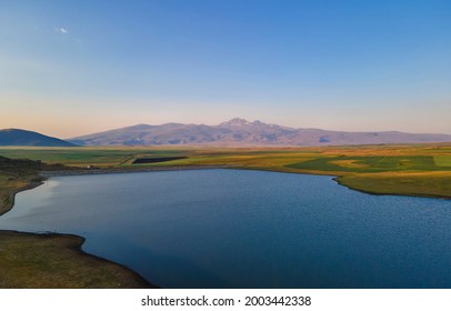 Beautiful Sunrise Time Lapse Sky And Clouds, Panoramic View On The Lake And Mountains.