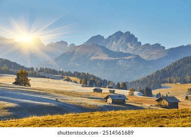 Beautiful sunrise view of meadow Seiser Alm Alpe di Siusi with Odle - Geisler mountain group on background. Morning autumn scenery in Dolomite Alps, South Tyrol, Italy. - Powered by Shutterstock