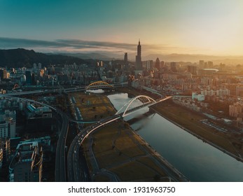 Beautiful Sunrise View Of Rainbow Bridge With Taipei City, Taiwan