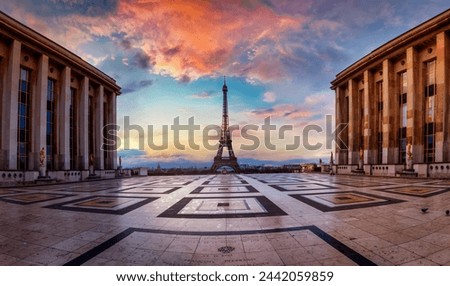 Beautiful sunrise view from Trocadero of the Eiffel Tower of Paris France with soft morning light and without people