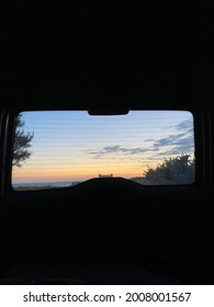 Beautiful Sunset At The Beach, View Through The Car Window