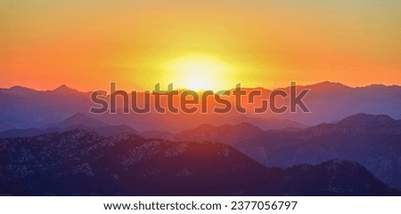 A Beautiful Sunset Behind the Mountains