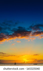 Beautiful Sunset Behind Sport Fishing Boat With A Flying Bridge On Maui, Hawaii, USA