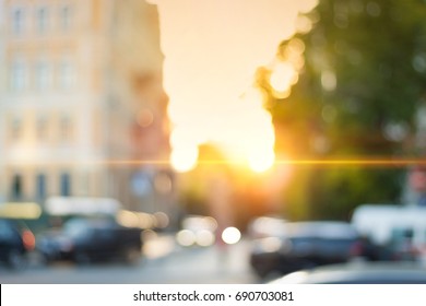 Beautiful Sunset City Bokeh. Blurred Background Photo. 