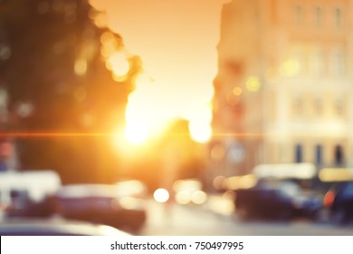 Beautiful Sunset City Bokeh. Blurred Background Photo. 