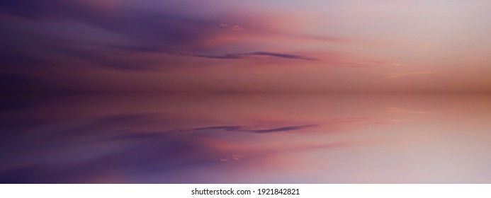 Beautiful sunset in the clouds over the sea  Red orange blue purple abstract background  Day   night  Idyllic  Vacation  Colorful sky   Copy space   Design  Web banner  Wide  Long  Panoramic  Cover 