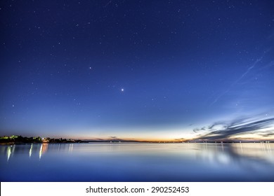 Beautiful sunset at dusk with stars above - Shutterstock ID 290252453