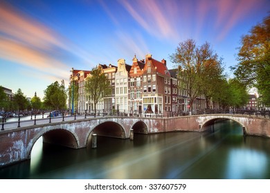 Beautiful sunset at the Emperors canal (Keizersgracht) and Leidse canal in Amsterdam in spring