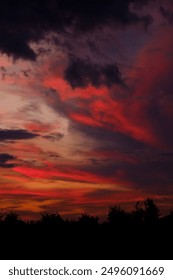A beautiful sunset featuring numerous clouds beautifully spread across the sky