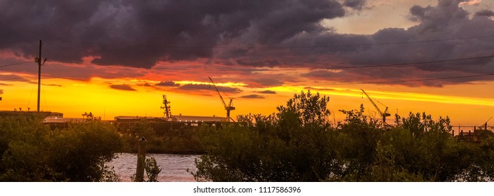 Beautiful Sunset With Ingalls Shipbuilding Cranes In The Frame, In Pascagoula, MS