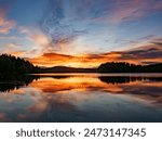 Beautiful sunset at the lake Tvällen in Bogen, one hours drive north of Arvika, just 10km from the Norwegian border. Sweden. North Europe