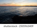 Beautiful sunset at Lake St Clair Metropark in Lower Michigan in Metro Detroit. Home to many lakes, Michigan offers amazing sunsets and sunrises. Brings back memories camping and road tripping.