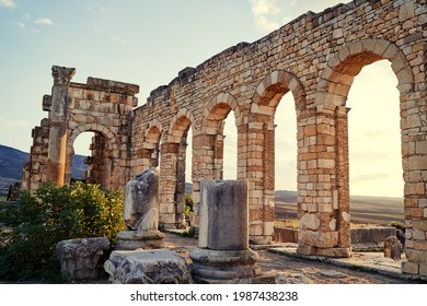 Beautiful Sunset Lanscape. The Ancient Antigue Roman City Volubilis In Morocco, Africa.