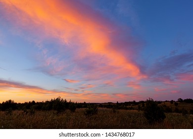 Beautiful Sunset In Masuria, Colorful Clouds.