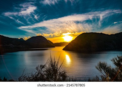 Beautiful Sunset In The Middle Of Mountains At Lake Lácar In San Martín De Los Andes, Argentina