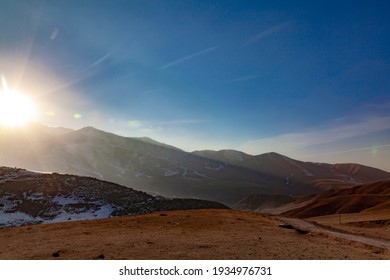 Beautiful Sunset In The Mountains Evening View Of The Tien Shan Mountain Range, Kyrgyzstan, View From The Mountain Slope Of The Ski Base