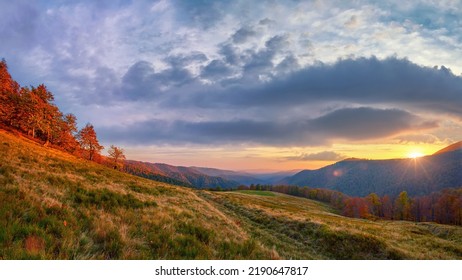 Beautiful sunset in the mountains, picturesque landscape in a mountain valley. The sun goes down behind the mountain range. Golden autumn in the Ukrainian Carpathians - Shutterstock ID 2190647817