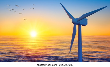 Beautiful sunset at ocean landscape with wind turbine silhouette in foreground and birds in background. Renewable or green energy concept. Environment friendly energy from wind power.