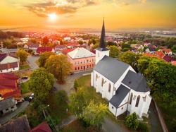 Beautiful Sunset Over Gothic Church St. Peter And Paul In The Litice Suburb Of Pilsen. Aerial View To Romantic Citiscape In Czech Republic, Central Europe. HDR (warm Filtered) Photography. 