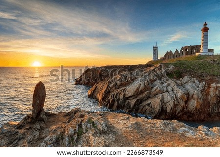 Beautiful sunset over the lighthouse at Saint Mathieu on the Bretagne coastline near Brest