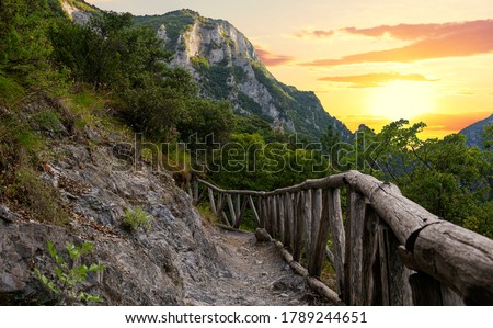 Beautiful sunset over Mount Olympus in Greece. This is the small road to Enipea source of the river Zeus Bath near the village of Litochoro