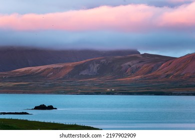 Beautiful sunset over mountain range and cloudy on coastline in peninsula on summer at Iceland - Powered by Shutterstock