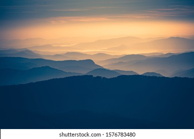 A beautiful sunset over the mountains. - Shutterstock ID 1576783480