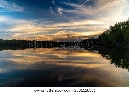 Similar – Image, Stock Photo Tranquil sunset over smooth water