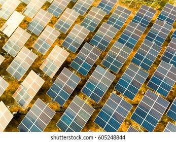 Beautiful sunset over Solar Farm with sunset on the background - Shutterstock ID 605248844