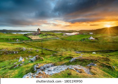 Beautiful sunset over the village of Rodel on the Isle of Harris in the Western Isles of Scotland, with St Clement's Church in the far left