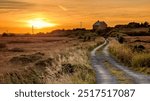 Beautiful sunset scenery with country house on the hillside at county Galway, Ireland, rural area, nature background