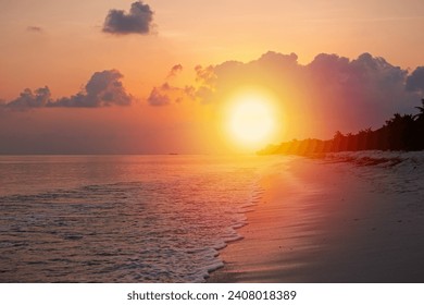 Beautiful sunset with sea waves surfing on sandy beach, nobody - Powered by Shutterstock