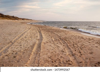 Beautiful Sunset Seascape With Sand Beach In Evening.