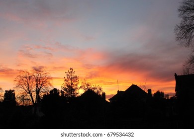 A Beautiful Sunset With The Silhouetted Skyline Of North West London.