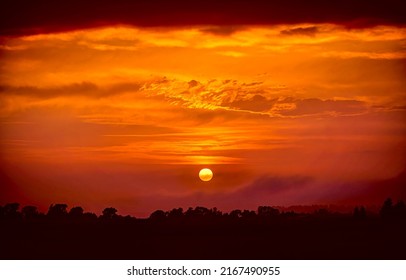 Beautiful sunset in the sky. Sunset sky landscape. Deep orange sunset in sky. Sunset sky - Shutterstock ID 2167490955