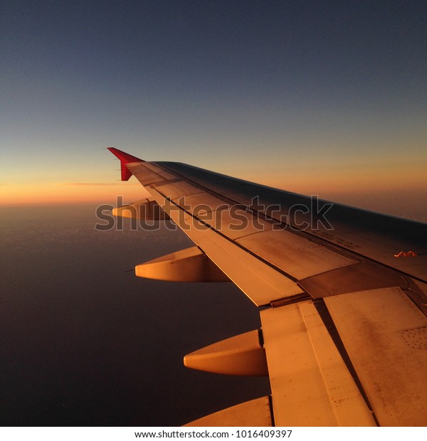 pretty sunset sky with plane