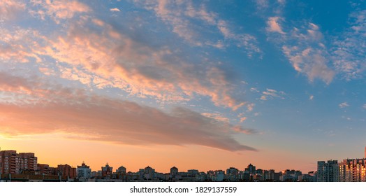 Beautiful Sunset Sky Over City. Twilight Over Urban District. Aerial View. Typical Modern Residential Area. Kyiv. Ukraine. Wide Panorama.