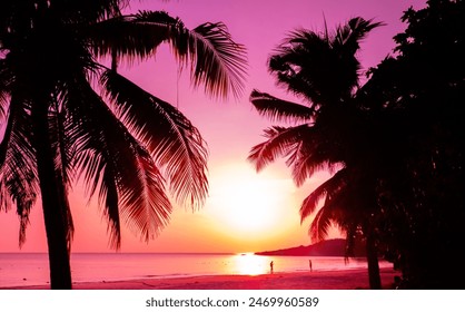 Beautiful sunset tropical beach with palm tree and pink sky for travel and vacation in holiday relax time - Powered by Shutterstock