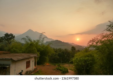 Beautiful Sunset View Through Mountain In Wayanad District