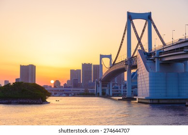 Beautiful Sunset View Of Tokyo Skyline And Rainbow Bridge 