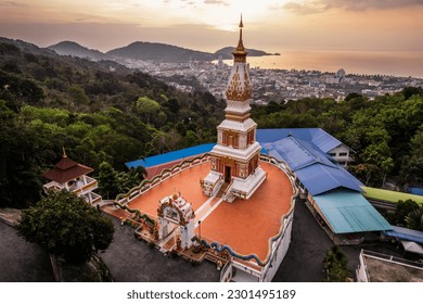 Beautiful sunset at Wat Doi Thep Nimit Monastery on the top of Patong hill in Phuket, Thailand.